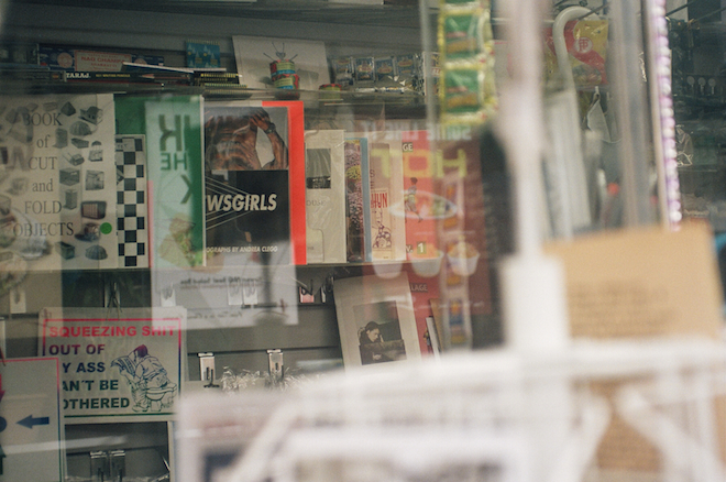 Inside the newsstand, a continued selection of artist publications and editions